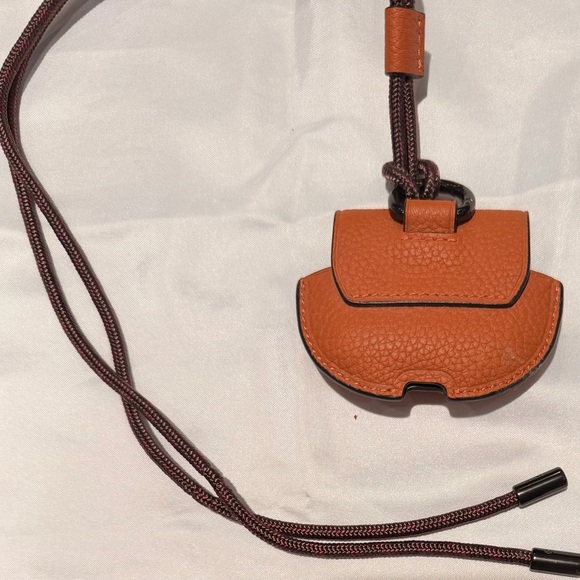 NWOT Coach large wireless earbud case, orange pebble leather w/lanyard strap - Picture 3 of 3